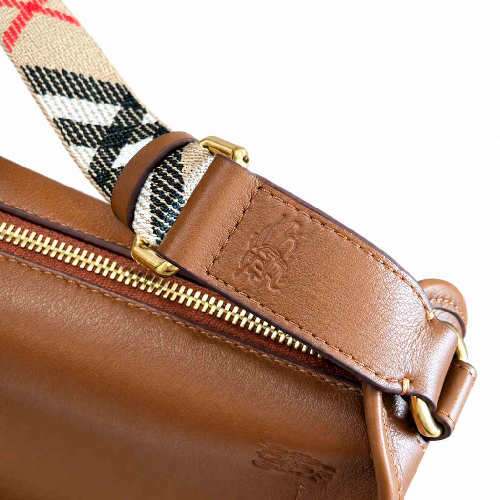 Burberry Cognac Saddle Bag with Heritage Check Strap